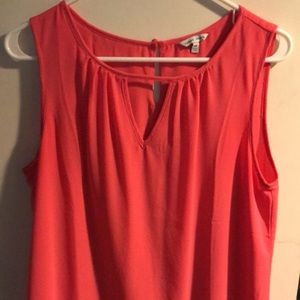 Tank top with flowered bottom.